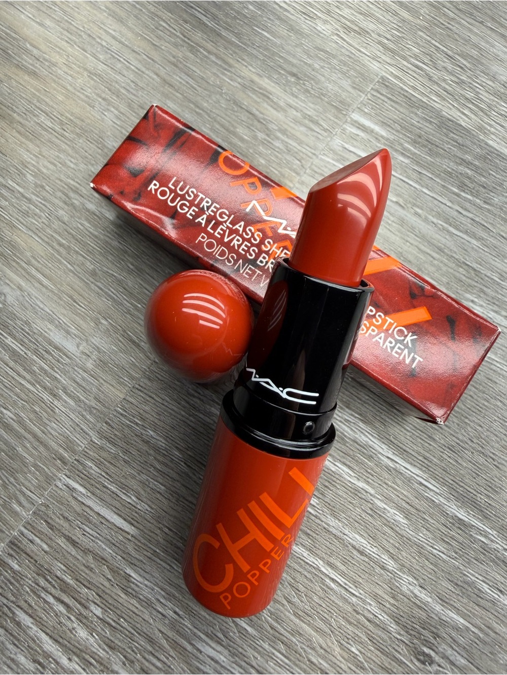 MAC Chill Popper Lustreglass Sheer Lipstick in “Chili Popper”